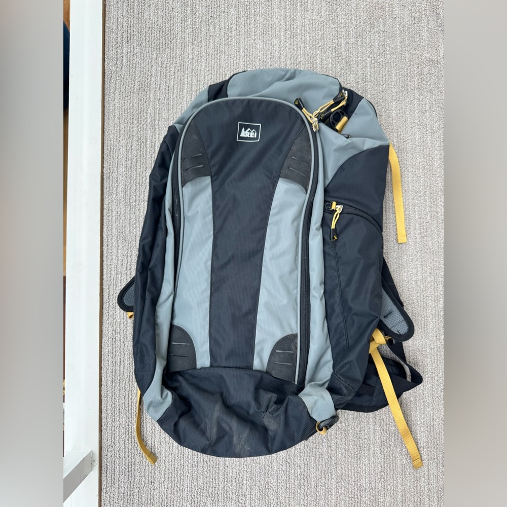 REI Vagabond Tour 40 backpack, grey and black with yellow accents